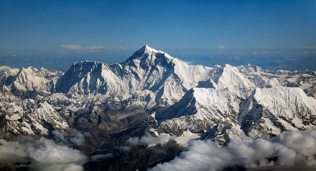 Mount Everest is the highest mountain in the world, standing at 29,032 feet above sea level. Located in the Himalayas, it is a popular destination for climbers seeking to conquer its peak.